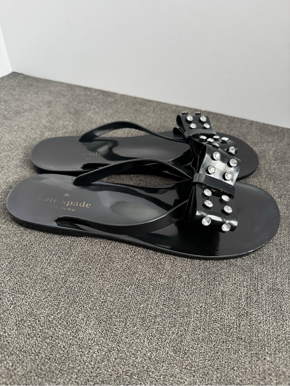 kate spade Black Jeweled Bow Jelly Sandals